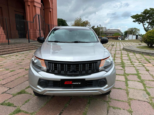 Imagen 7 de 17 de Mitsubishi L200 2.4 Cab Dob 4x4 2abag Abs Espejos Pr.caja