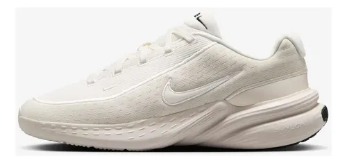 Vista lateral externa do tênis Nike Uplift Sc na cor off-white