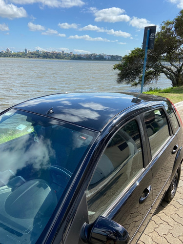Imagem 8 de 14 de Fiesta Hatch 1.6 8v Flex 4 Portas + Gnv 2011