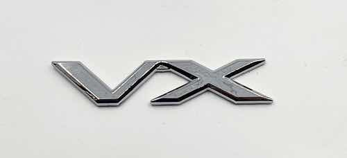 Emblema Vx Para Toyota Prado Nuevo Con Adhesivo Para Pegar