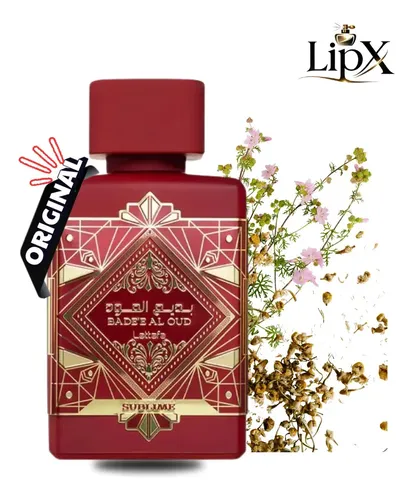 Frasco de perfume Lattafa Bade'e Al Oud Sublime de 100ml com tampa vermelha, posicionado ao lado de ramos de flores secas e um selo de produto original