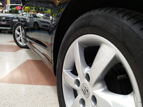 Nissan Tiida Sl.mec+teto+couro Completo
