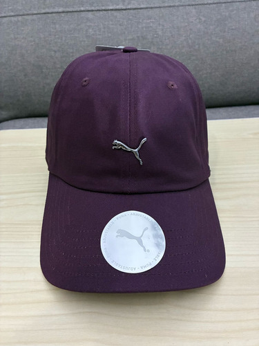 Gorra Morada Puma Unisex Unitalla Mod.025793 10 Morada Unitalla Liso