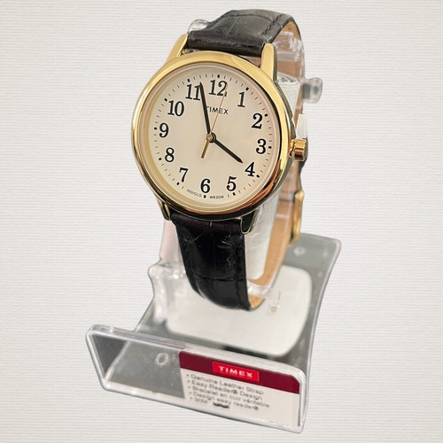 Reloj Mujer Timex Correa De Piel Luz Indiglo Tw2r633009j Correa Negro Bisel Dorado Fondo Blanco