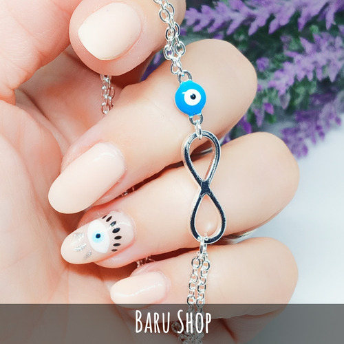 Imagen 5 de 9 de Pulsera Acero Blanco Con Dije Diseño Infinito Y Ojo Turco