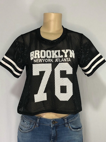 Imagem 1 de 4 de Blusa Preta Tecido Furadinho Academia