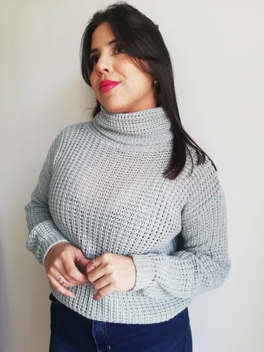 Buzo con cuello volcado new arrivals