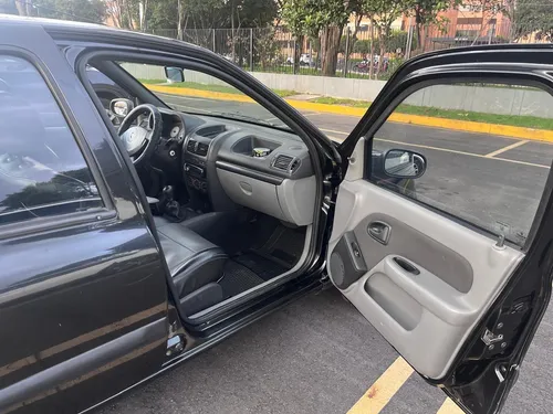 Renault Clio Modelo 2009, Bogotá, Placa Impar, V Electricos