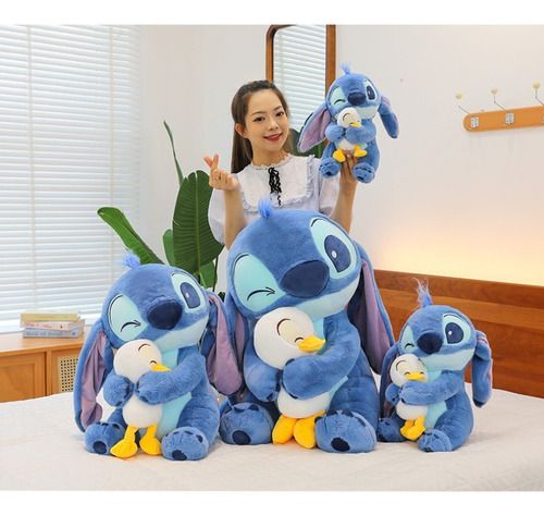 Peluche Stitch Abrazando A Un Pato Lilo & Stitch Azul
