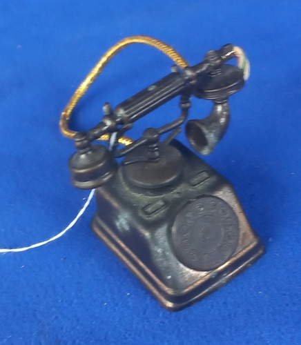Sacapuntas Miniatura Fisonomia Telefono. De Bronce