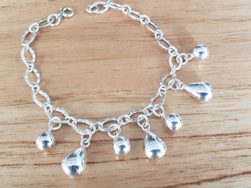 Imagen 2 de 6 de Pulsera Modelo Polonia En Plata 925 Con Dijes Varios