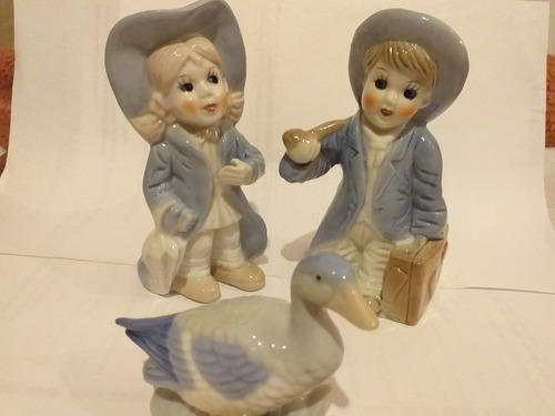 Figuras De Ceramica Impecables Bellisimas Niños Con Pato Azul Claro (Usado)