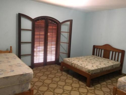 Casa Lado Praia Com Piscina Em Peruíbe - 5937