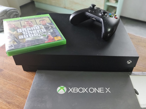 Consola Xbox One X + Joystick+ Juego. 