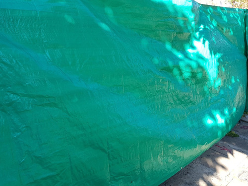 Imagen 5 de 9 de Cubre Cerco Con Ojales Rafia Verde 1.50 Mts Por 50mts Gpi.