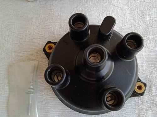 Tapa Distribuidor Festiva 1.3l Mazda323  Swift 1.3l Spartan