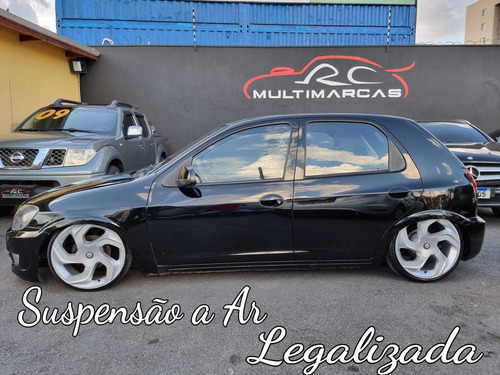 Imagem 13 de 14 de Gm Celta Lt 1.0 Flex 4ptas Completo (+) Suspensão A Ar 2013