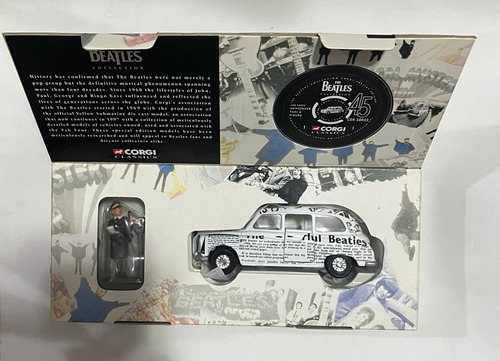 The Beatles Corgi Newspaper Taxi Con Figura 1997