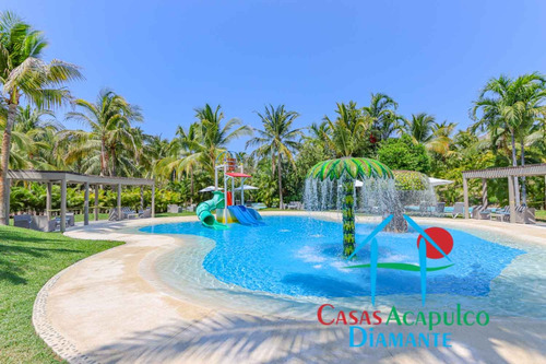 Cad La Isla Gran Caimán 604. Terraza Con Vista A Los Jardines Y Albercas