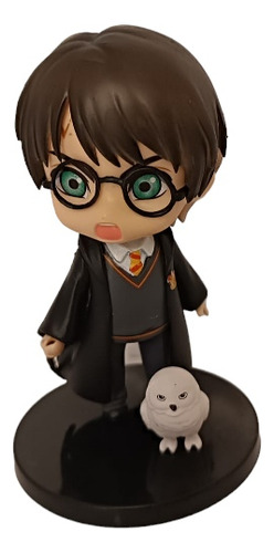 Figura De Harry Potter Con Varita Y Mascota