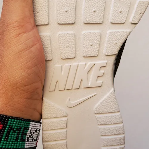 Nike tanjun racer verde top