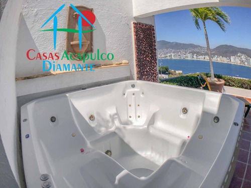 Imagen 7 de 14 de Cad Brisas Diamante 70. Terraza Con Jacuzzi Y Vista Al Mar