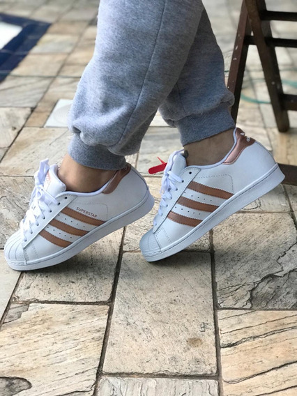 tenis adidas superstar feminino branco e dourado