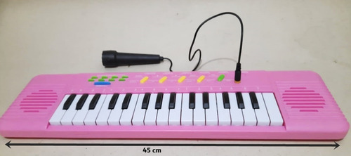 Imagem 2 de 7 de Teclado Infantil Rosa Com Microfone - Musical Resistente
