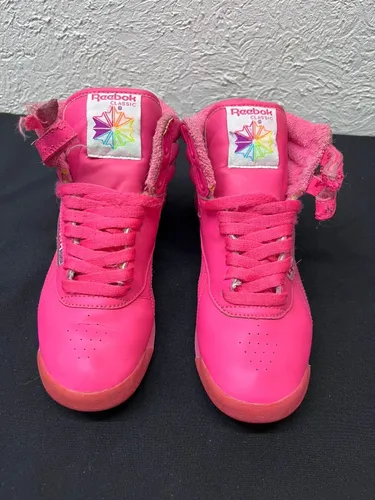 Pink freestyle reebok best sale