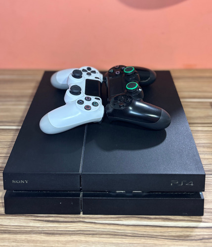 Playstation 4 Fat 500gb - Acompanha 2 Controles E 1 Jogo Preto