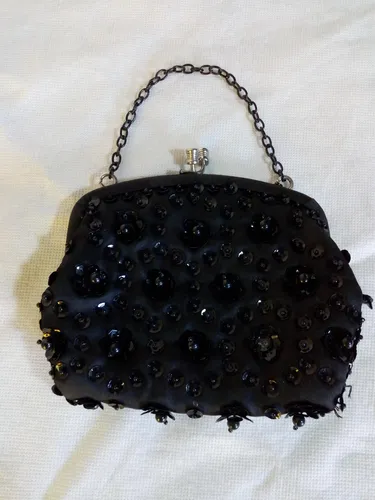 Cartera negra fiesta hotsell