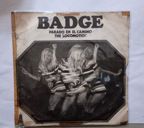 Badge The Locomotion /  Parado En El Camino (simple) Disco