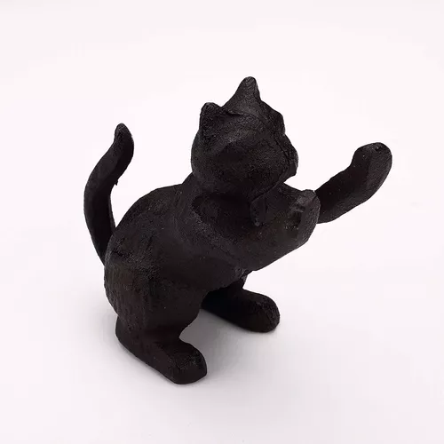 Balvi sujeta libros figura gato