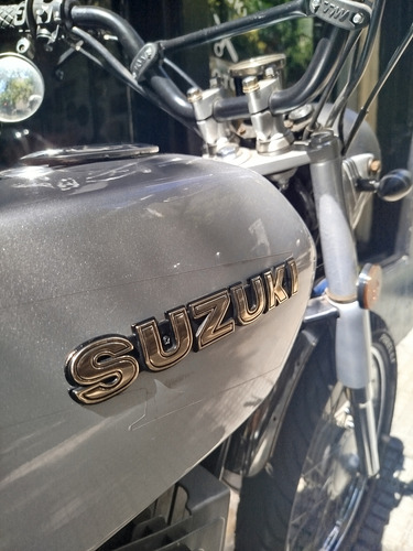 Suzuki Ax 100