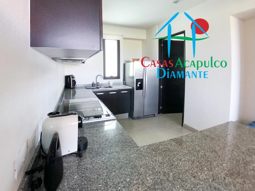 Cad La Isla Gran Caimán 604. Terraza Con Vista A Los Jardines Y Albercas
