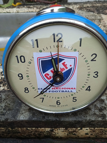 Antiguo Reloj Con Alarma Y Con El Logo De Nacional