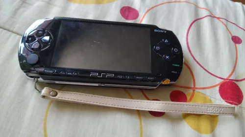 comprar Psp Sony Original Con Dos Juegos Físicos Y 5 Digitales