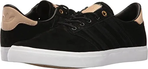 Adidas seeley negras sale