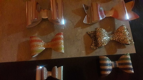 Vinil, Charol, Glitter. Moños