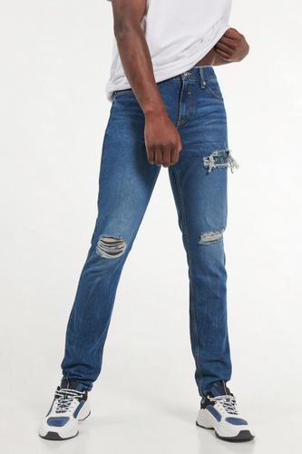 Jean Skinny Azul Medio Tiro Bajo Con Rotos Y Parches En Fren