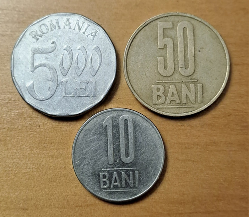 Rumanía X 3 Monedas Incluye 5000 Lei 2002. Usadas !!!