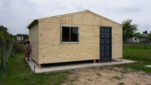 Imagen 14 de 18 de Prefabricada De 25m2 Con Aberturas De Madera Techo De Chapa