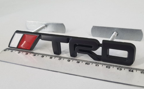 Imagem 4 de 4 de Emblema Trd Toyota Hilux Grade Dianteira Sw4 Srv Com Suporte