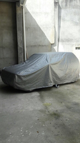 Imagem 3 de 6 de Capa Cobrir Carro 100% Impermeavél Corsa Corolla Cronos Fox