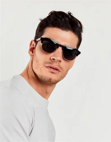 Gafas de sol Hawkers Lifestyle New Classic diseño Diamond Black Dark armazón negro brillante/plata y lente negro