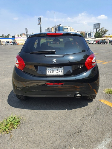 Imagen 7 de 15 de Peugeot 208 2015 1.6 Féline Nav At