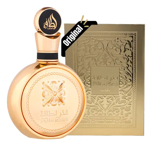 Frasco de perfume Fakhar Gold Lattafa dourado ao lado de sua caixa de luxo