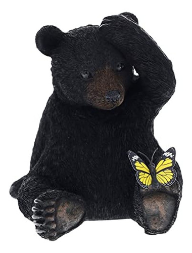 Figura Whimsica De Un Oso Negro Sentado Y Una Mariposa,...