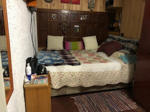 Casa Muy Bien Tenida / Cerro 18 Sur