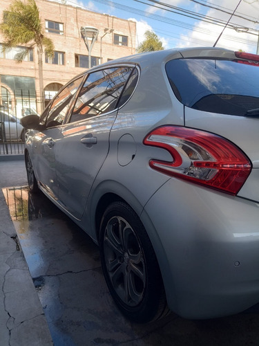 Imagen 5 de 18 de Peugeot 208 Feline Pack Cuir (2014 ; 120.000km)